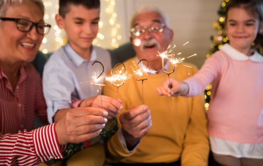 Seniors and grandchildren with 2020 sparklers