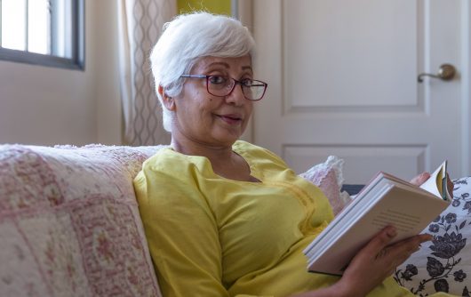 Senior woman reading book