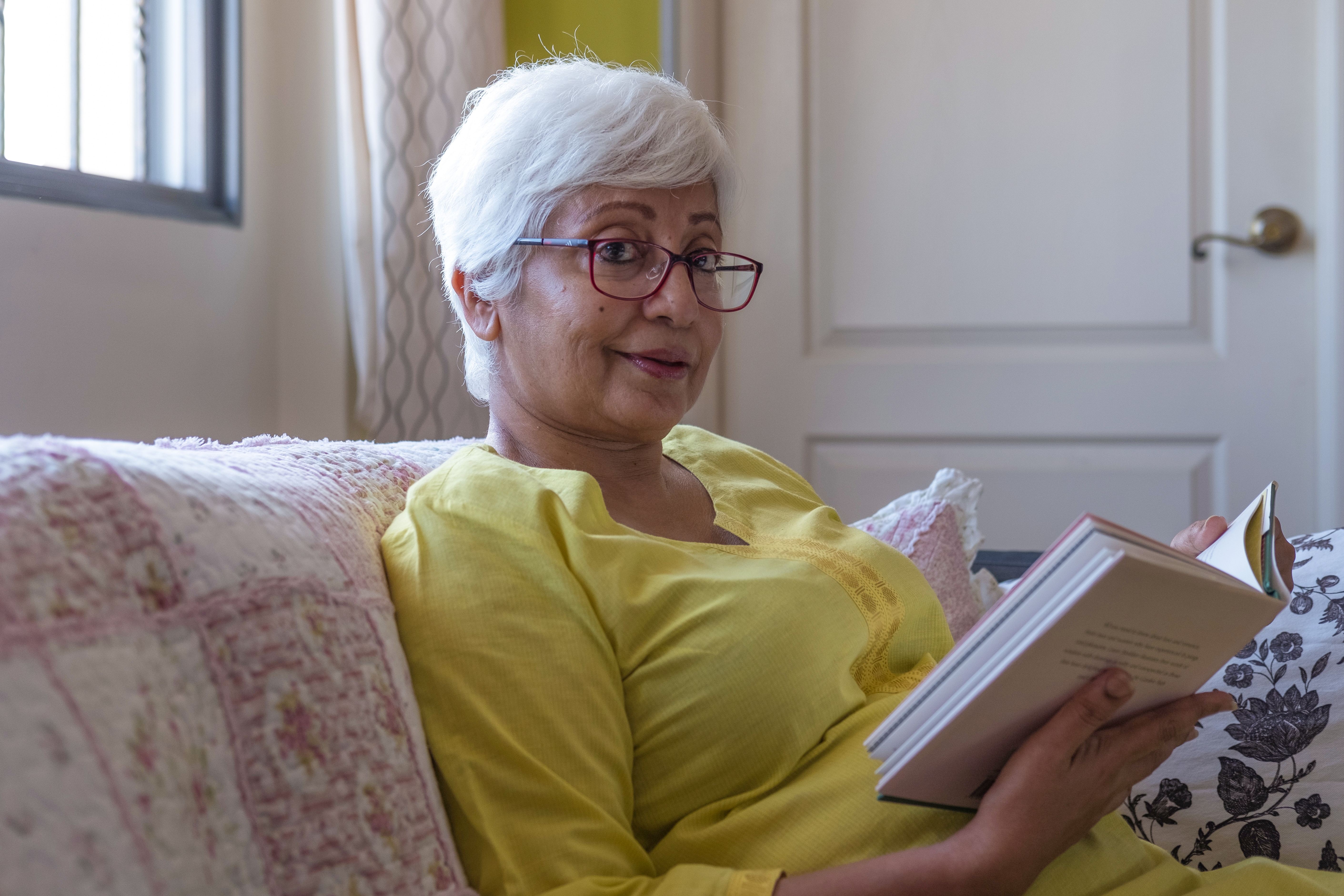 Senior woman reading book