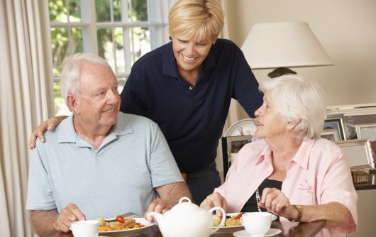 Senior couple enjoying meal together