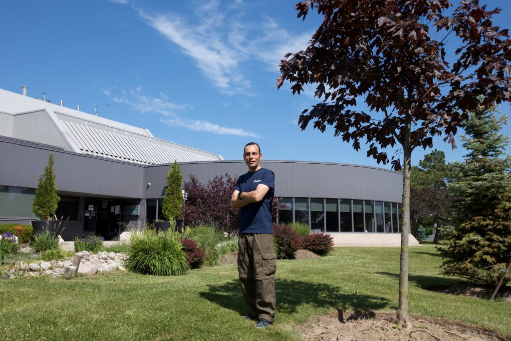 Roger Rebelo standing proud outside National Office