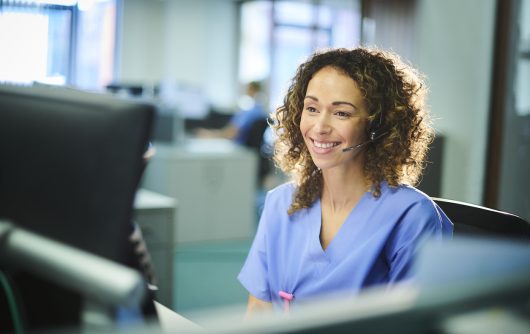 Smiling medical customer service rep