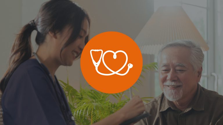 A nurse talking with an elderly man in a room
