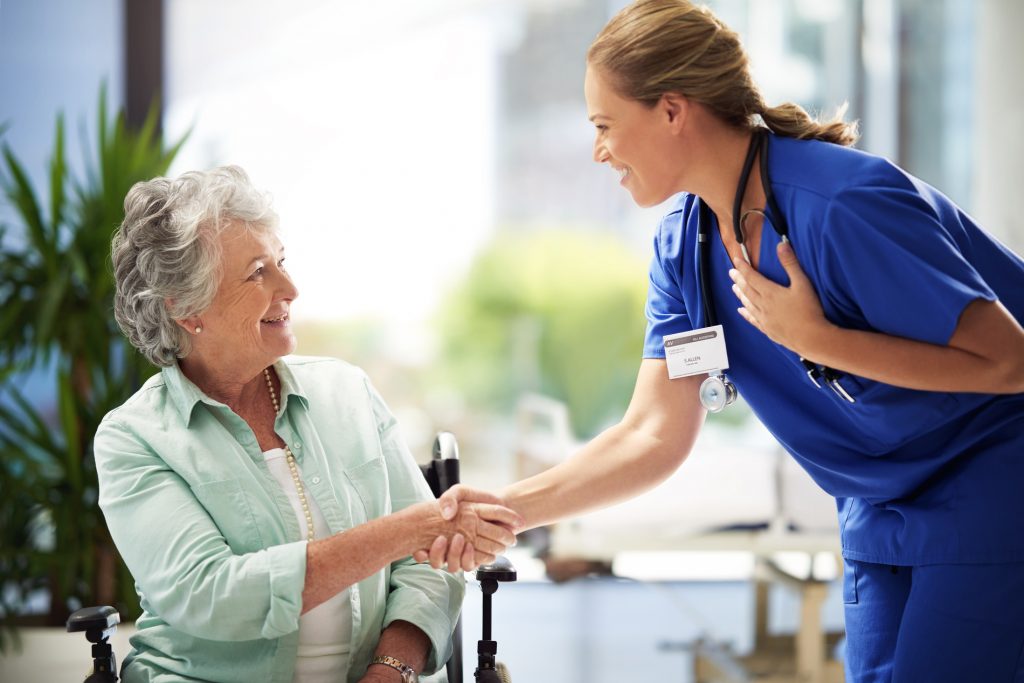 Nurse meeting senior