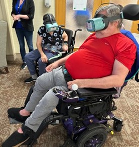 Subheading#5 TCU patient activity photo#2 Patients in wheelchairs having cun with VR googles